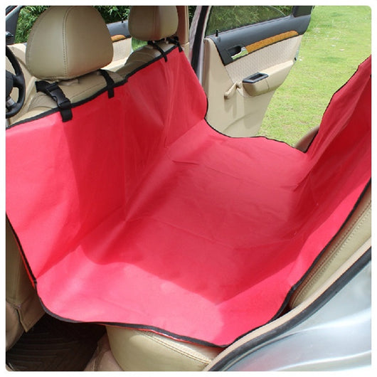 Black Oxford cloth pet car seat cover installed in a car's back seat, forming a hammock to protect upholstery. - Image 7