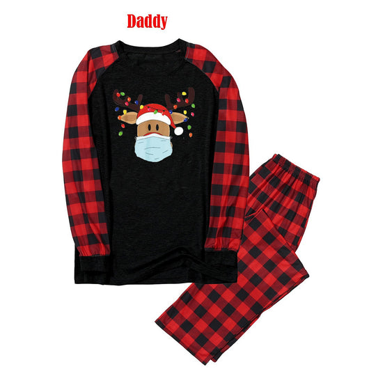 Matching family Christmas pajamas with grey tops, red plaid sleeves, and a reindeer wearing a Santa hat and face mask. - Image 14