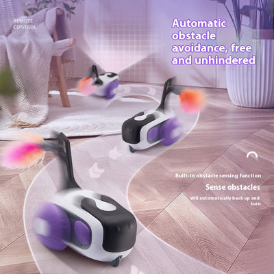 White and black remote control cat toy car with purple wheels and an orange feather, next to a white cat-shaped remote. - Image 4