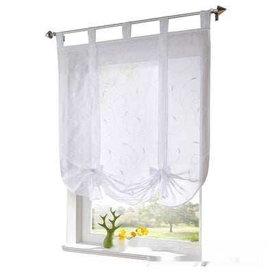 White sheer Roman window screen with red embroidered floral patterns and red ribbon ties, hanging from a silver rod. - Image 6