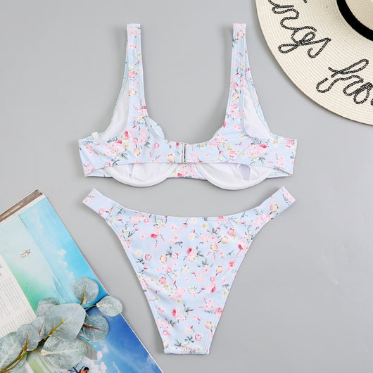 Light blue floral bikini with pink and yellow flowers, featuring an underwire top and high-cut bottom. - Image 18