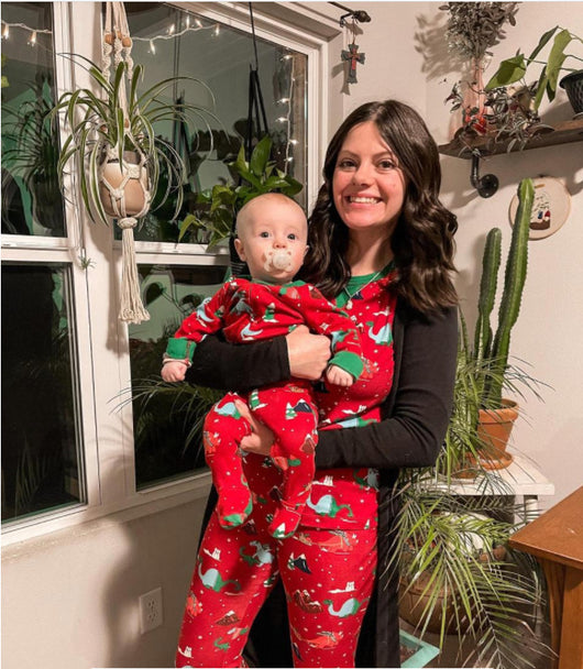 Red long-sleeved men's pajama set with a festive dinosaur and Christmas tree print, featuring green cuffs. - Image 12