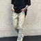 Jeans Slim Fit Desgastados con Roturas