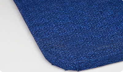Blue and white striped fish-shaped sisal cat scratching post with a purple base, next to a black and white cat. - Image 11