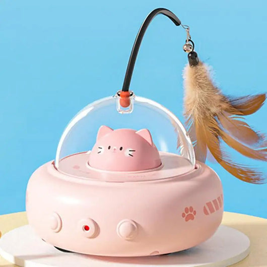 Electric interactive cat toy with a beige base, clear dome, and a cute cat head inside. Features a feather teaser wand with a bell. - Image 21