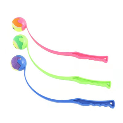 Pink pet throwing cue with a yellow and orange tennis ball, designed for outdoor dog training and play. - Image 6