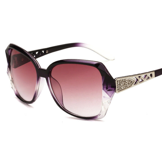 Women's retro big frame sunglasses with brown faceted frames, gradient purple lenses, and rhinestone-detailed silver temples.