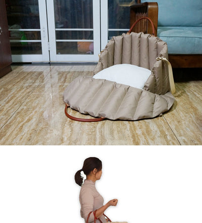 Light khaki quilted portable pet carrier with brown handles and a cream shoulder strap for car travel. - Image 13