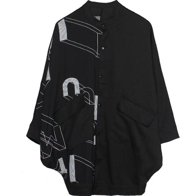 Blusa Suelta con Patrón Geométrico y Mangas Murciélago - Image 9