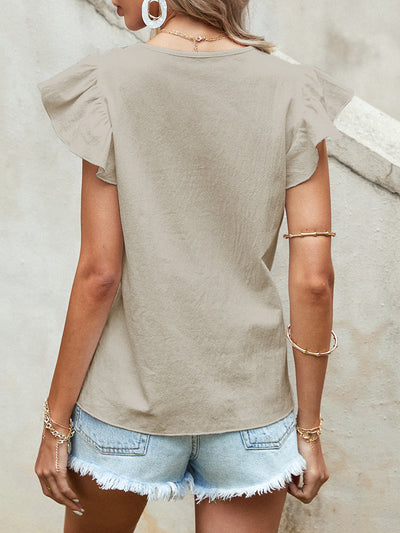 Blusa Blanca de Algodón con Volantes y Panel Bordado - Image 4