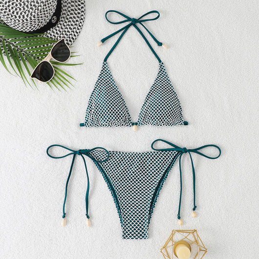 Blue and white mesh triangle bikini set with tie-side bottom and shell accents, displayed on a white beach towel. - Image 11