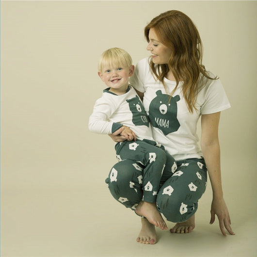 Father and son wearing matching white and dark gray bear-themed pajamas, featuring a 'PAPA' bear graphic. - Image 13