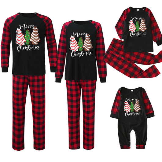 Family matching Christmas pajamas with black tops featuring a wine glass in a Santa hat graphic and red plaid bottoms. - Image 5