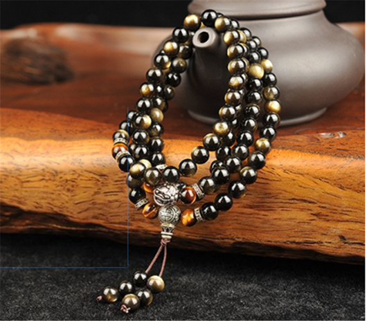 Pulsera de Obsidiana Dorada con 108 Cuentas Buda y Plata Tibetana - Image 10