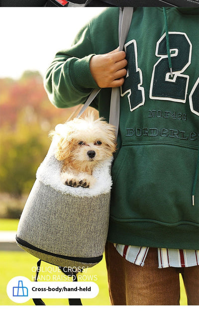 Grey pet car seat with plush white lining, designed for small dogs or cats, placed on a car's center console. - Image 15
