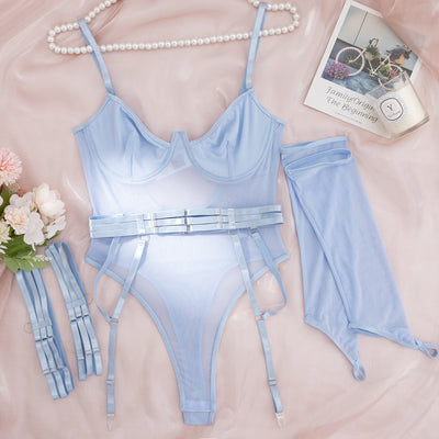 Pink mesh see-through jumpsuit with garter straps and matching arm sleeves, laid flat on a pink background. - Image 10