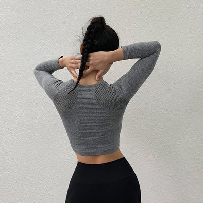 Top Deportivo Ajustado de Manga Larga con Detalles Calados - Secado Rápido para Yoga y Fitness - Image 4