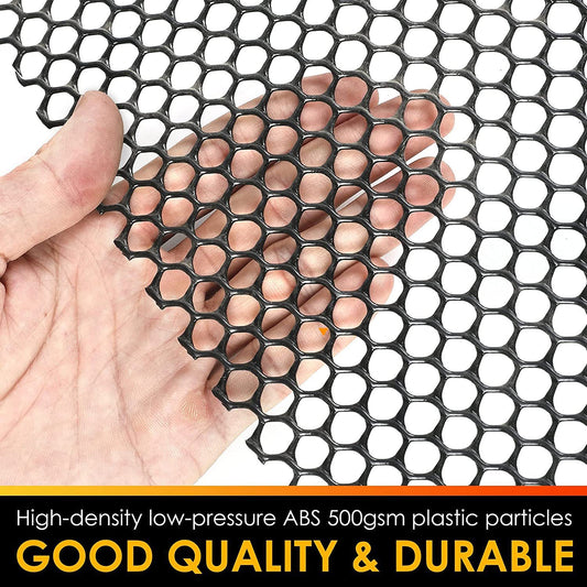 White plastic chicken wire mesh roll with hexagonal openings, showing transparency with a hand behind it.