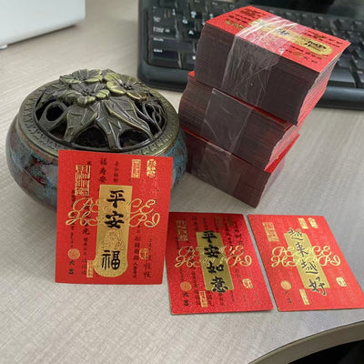 Two rectangular mobile phone stickers, one red and one gold, with gold foil Chinese characters. The red sticker says "Ping An Ru Yi," and the gold sticker has r
