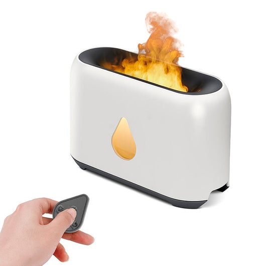 White aroma diffuser with a 3D flame effect and a gold water droplet icon, shown with a remote control. - Image 10