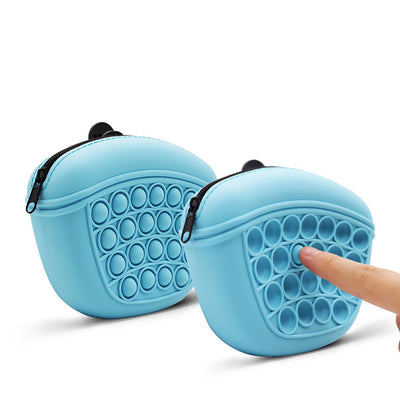 Light blue silicone pet treat pouch with a pop-it fidget design and black zipper closure. - Image 10