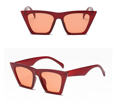 Transparent nude cat-eye sunglasses with brown gradient lenses, featuring a vintage 90s fashion style for women. - Image 11