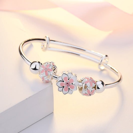 Pulsera Giratoria de Cobre con Cisne y Cuentas Plateadas - Image 4
