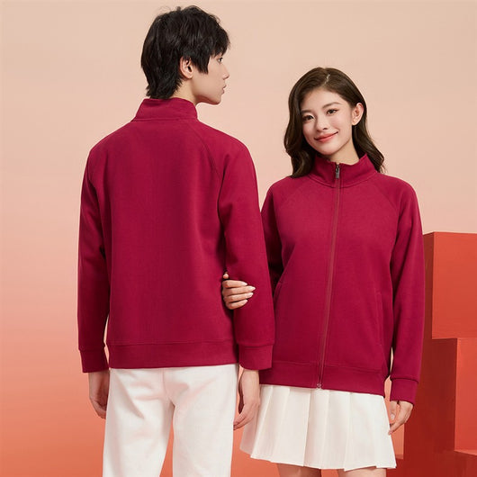 Purple full-zip jacket with a stand-up collar, raglan sleeves, and front pockets, displayed on a hanger. - Image 39