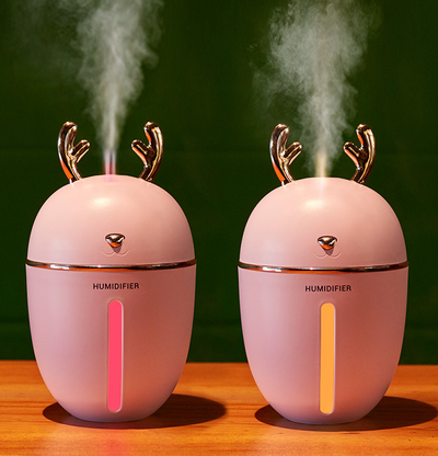 Pink deer-shaped ultrasonic humidifier with gold antlers, a white USB fan, and a white USB light. - Image 9