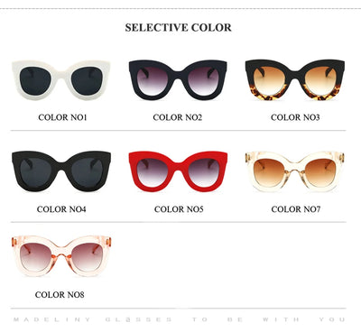 Transparent pink cat-eye sunglasses with gradient gray lenses, featuring a thick frame and vintage style. - Image 13