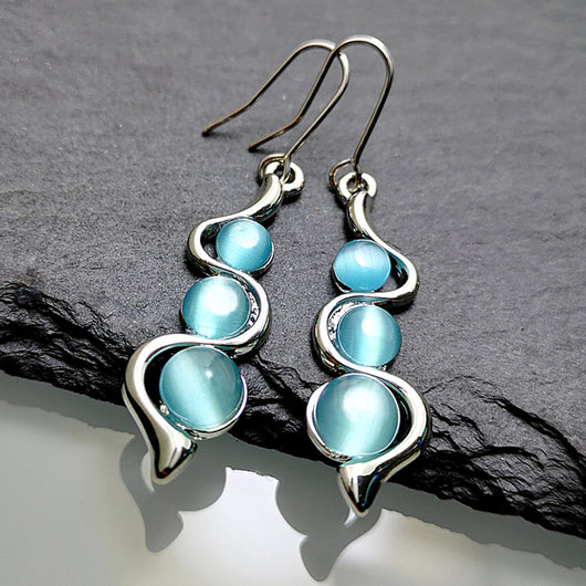 Aretes Ondulados Estilo Bohemio con Gema Ojo de Gato - Image 5