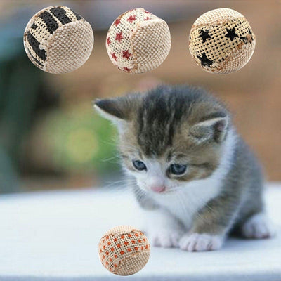 Four interactive cat toy chewing balls with woven textures and various patterns including polka dots, stripes, and stars.