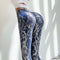 Pantalones Yoga Ajustados con Patrón Piel de Serpiente - Estirables y Cómodos
