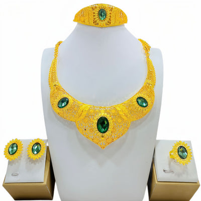 Golden jewelry set with a wide necklace, cuff bracelet, stud earrings, and ring, all featuring blue oval gemstones and intricate filigree patterns. - Image 6