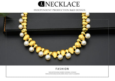 Women's four-piece jewelry set with matte gold teardrop links and white pearls, including a necklace, earrings, ring, and bracelet. - Image 8