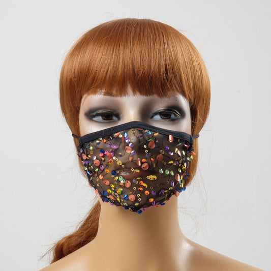 Black mesh face mask with colorful sequins, displayed on a mannequin with reddish-brown hair.