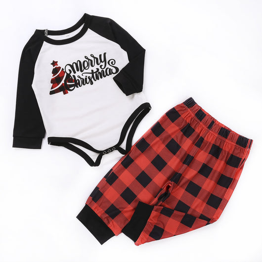 White long-sleeve pajama top with "wild one" graphic and red and black plaid pants. - Image 11