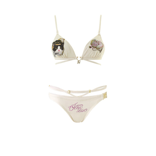 Retro newspaper print two-piece swimsuit set with a backless triangle bikini top and matching cut-out bottoms. - Image 13