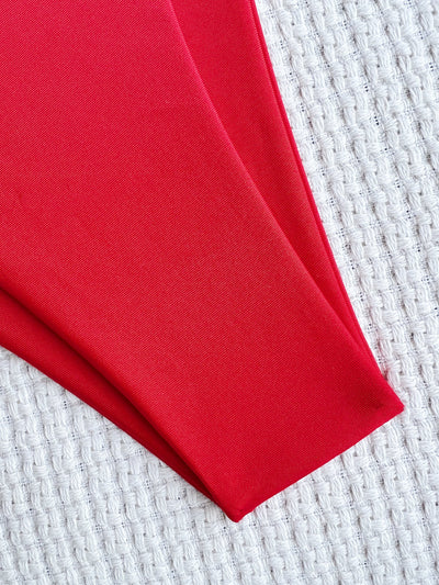 Red one-piece swimsuit for women featuring an asymmetrical one-shoulder design, front cut-outs, and a twisted detail. - Image 9