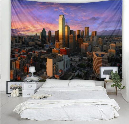 Large rectangular tapestry featuring a vibrant city landscape at sunset with tall buildings and a purple-orange sky.
