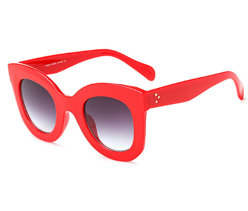 Transparent pink cat-eye sunglasses with gradient gray lenses, featuring a thick frame and vintage style. - Image 8