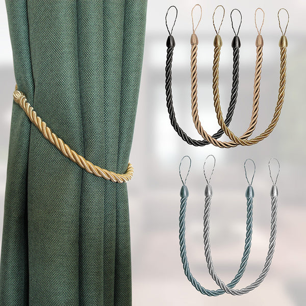 Four beige twisted rope curtain tie-backs with loops, shown with two silver screw-in hooks and on sheer white curtains.