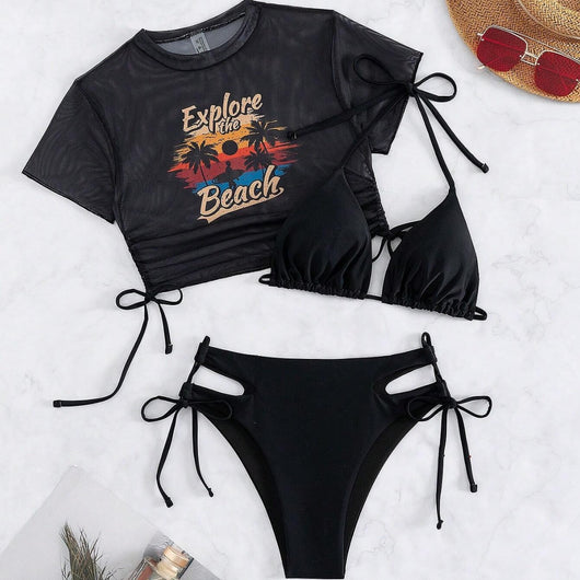 Black three-piece swimsuit with a mesh crop top featuring an "Explore the Beach" graphic, bikini top, and high-waisted bottoms. - Image 3