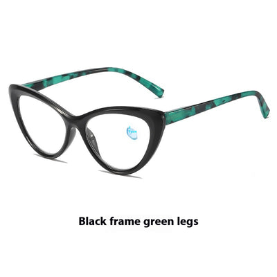 Black cat-eye anti-blue light reading glasses with green patterned temples on a white background. - Image 9