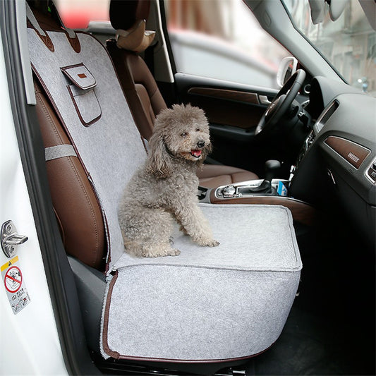 Light grey pet car seat with brown trim on a car's front passenger seat, holding two small dogs. Includes a black pet seatbelt tether. - Image 2