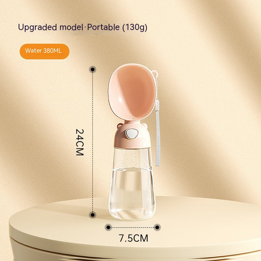 Yellow portable pet water bottle with clear reservoir, built-in drinking bowl, and wrist strap, 28cm tall. - Image 12
