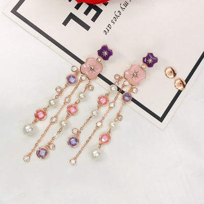 Aretes Estrella de Ocho Puntas Dorados con Diamantes y Borla de Perla - Image 9
