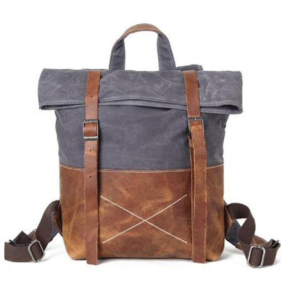 Mochila de Viaje en Lona Encerada Resistente con Detalles en Cuero Premium