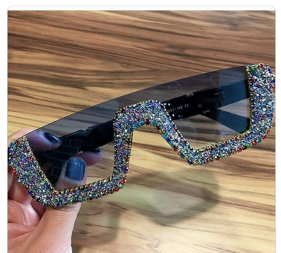 Black square sunglasses with a wavy top frame embellished with brown and clear rhinestones and gradient smoke lenses. - Image 10