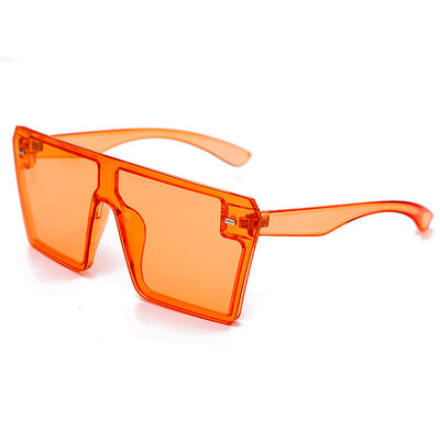 Oversized flat-top sunglasses with translucent red plastic frames and matching red lenses on a white background. - Image 5